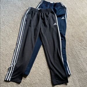 Two pair of kids Adidas track pants, both size large